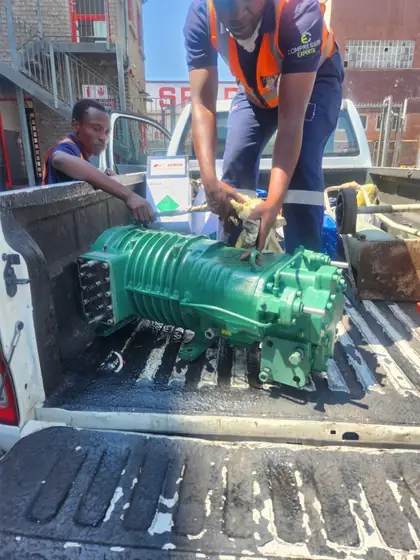 A low temperature application screw compressor being transported to the workshop for repairs