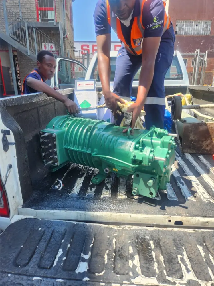 A low temperature application screw compressor being transported to the workshop for repairs